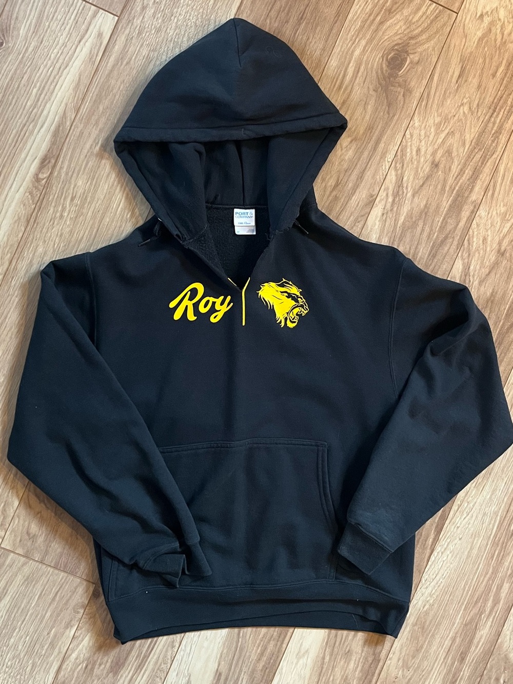 Unique vintage black hoodie w/ yellow lion graphic & rip detail